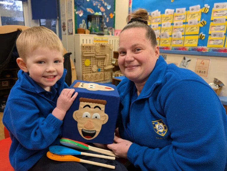Kidderminster youngsters take part in mental health awareness day With the emotions cube and spoon puppets, 4-year-old Roman Whitehouse and Little Trinity’s Emma Browning.