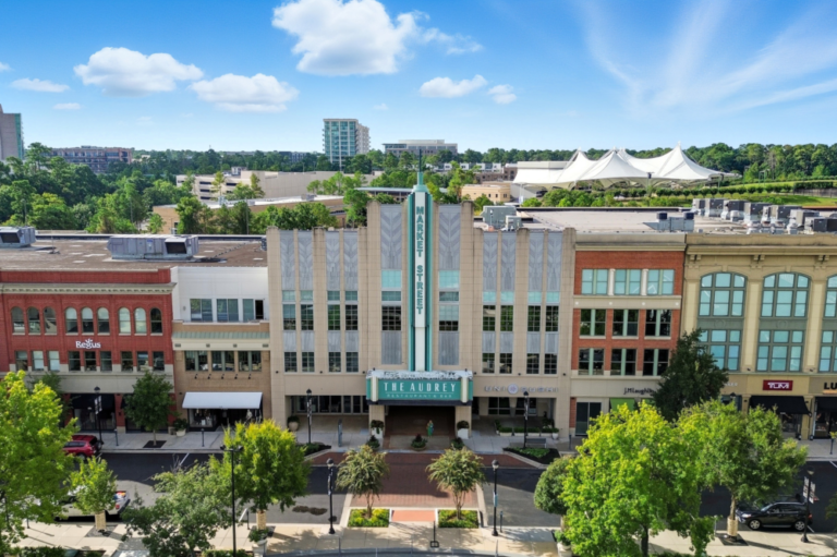 5 steps to turn your savings into a retirement plan The Woodlands street with buildings