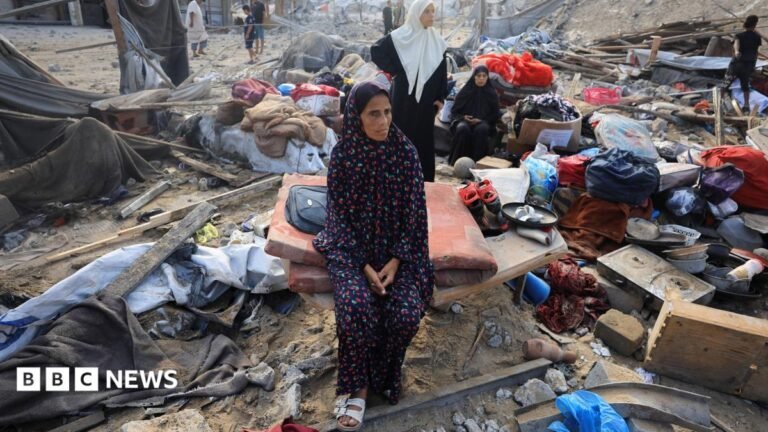 If Hamas disarmament plan holds, it could mark first credible step to ending Gaza war A Palestinian woman sits amidst debris as people inspect the site of an Israeli strike on a house in Gaza City, 30 July 2026.