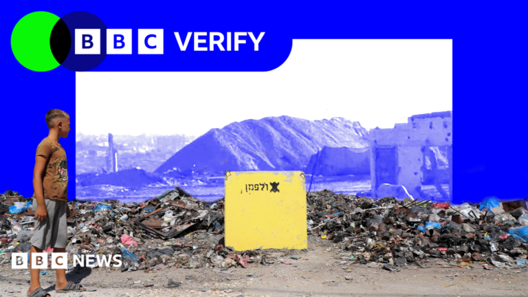 Israel building new land barriers in Gaza and displacing families A young boy looks at a yellow block placed among rubble in Gaza. In the background an earth barrier is shown next to a building in blue scale inside a blue BBC Verify frame.