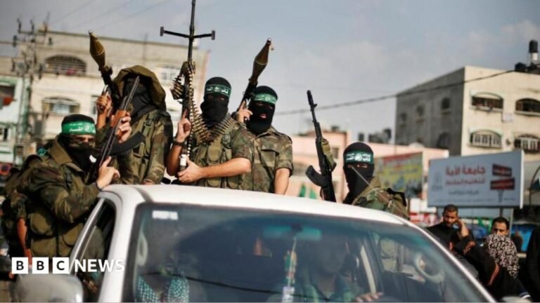 Israeli official says troops won’t pull back in Gaza without ‘genuine’ Hamas disarmament FILE PHOTO: Hamas militants celebrate what they say is a victory over Israel after an eight-day conflict during a rally in the northern Gaza Strip November 22, 2012