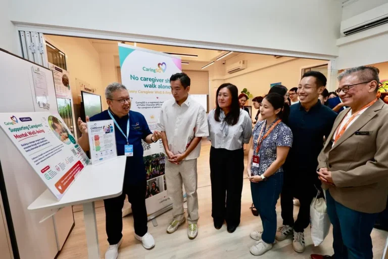 Senior Parliamentary Secretary for Social and Family Development Eric Chua (second from left) said CaringSG’s CAREmind programme will help caregivers get the support they need.