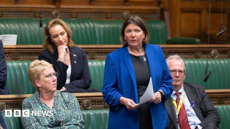 Barred MP Ellie Chown ‘had no intention of visiting Israel anyway’ A cut of of Anthony Zurcher wearing a suit and tie in front of a red, black, grey and blue graphic background featuring the US Capitol Building