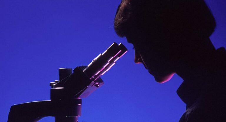 Exceptional Detection Rates of Bladder Cancer Recorded in Study of Simple, Yet State-of-the-Art Test woman scientist microscope research lab test-pubdomain National Cancer Institute