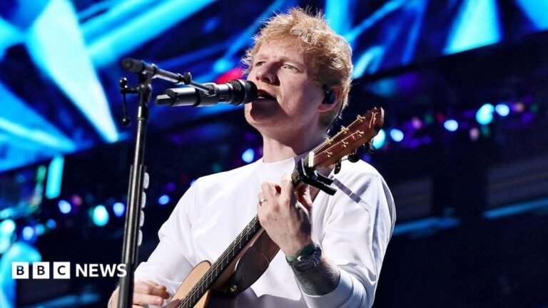 Robert Kraft says Ed Sheeran asked him to donate $2m to aid after Macklemore backlash American rapper Macklemore performs live on stage during the 5th Lollapalooza Paris Festival on July 19, 2025 in Paris, France.