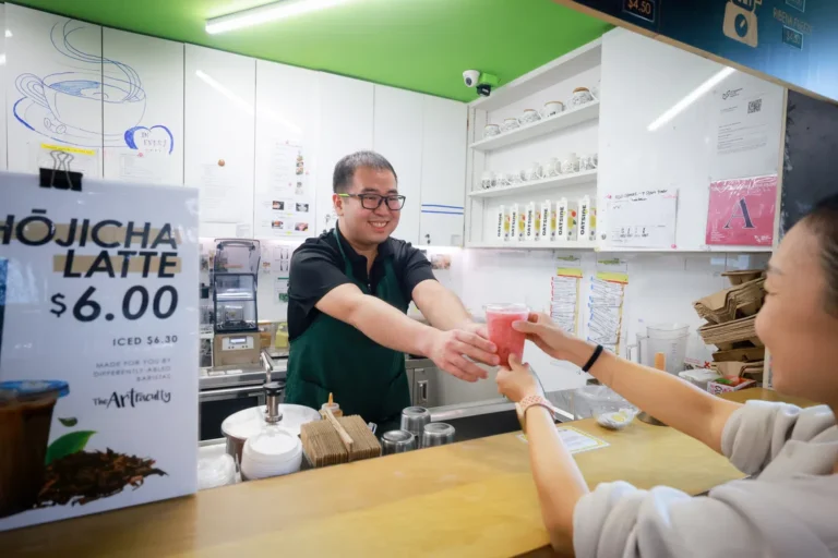 More support for people with disabilities in S’pore by 2030 Barista Caleb Lim, 31, who has autism spectrum disorder, serving a customer at the Enabling Village's Art Bar on Oct 2.